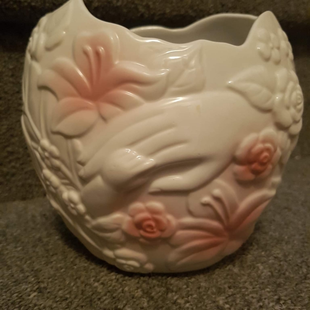 Vintage porcelain vase of mother and child holding hands